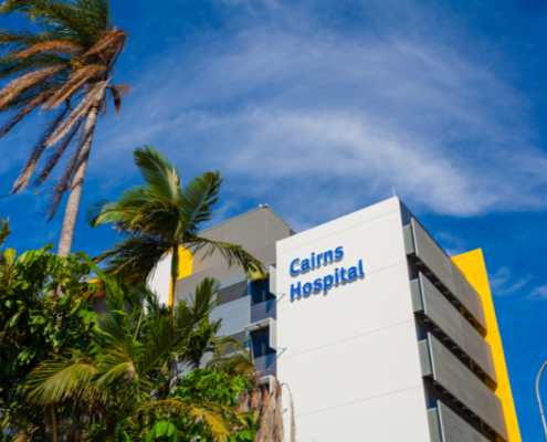 Cairns Hospital with palm trees in the foreground