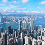 A panoramic photo of Hong Kong's skyscrapers on a sunnny day