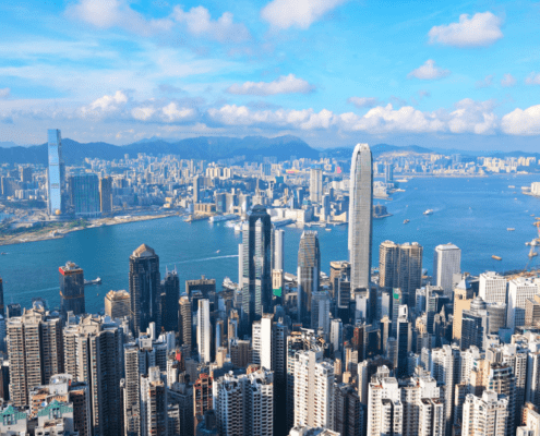 A panoramic photo of Hong Kong's skyscrapers on a sunnny day